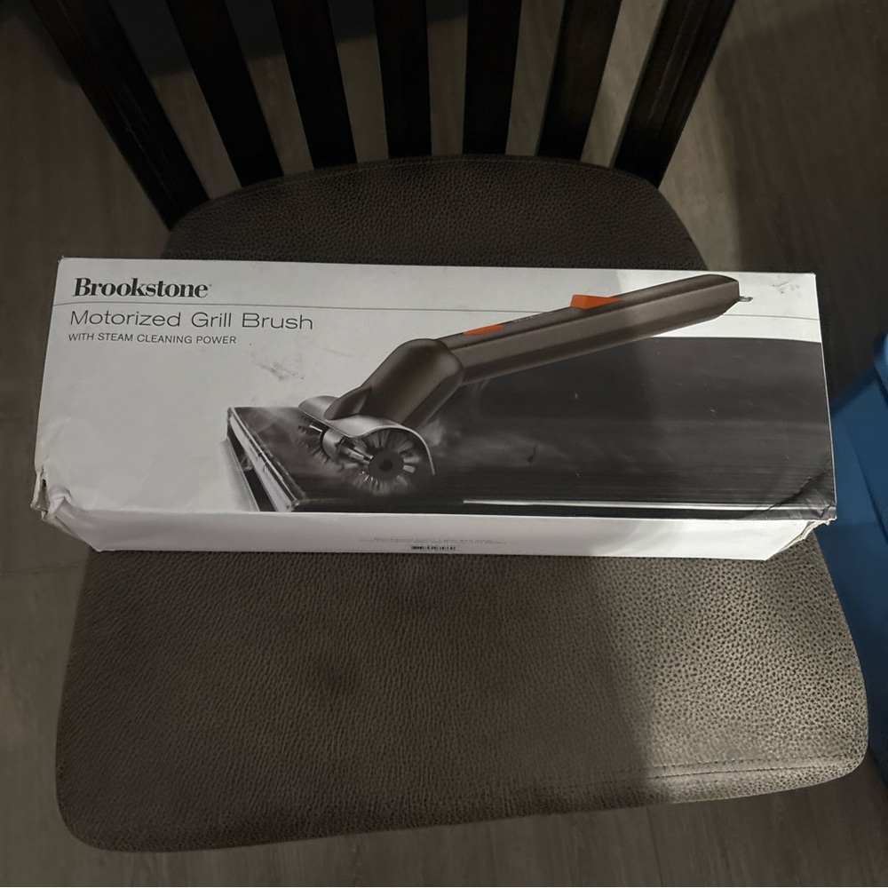 Brookstone Black and Silver Motorized Grill Cleaner